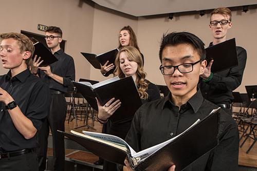 students singing