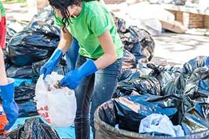 student sorting waste