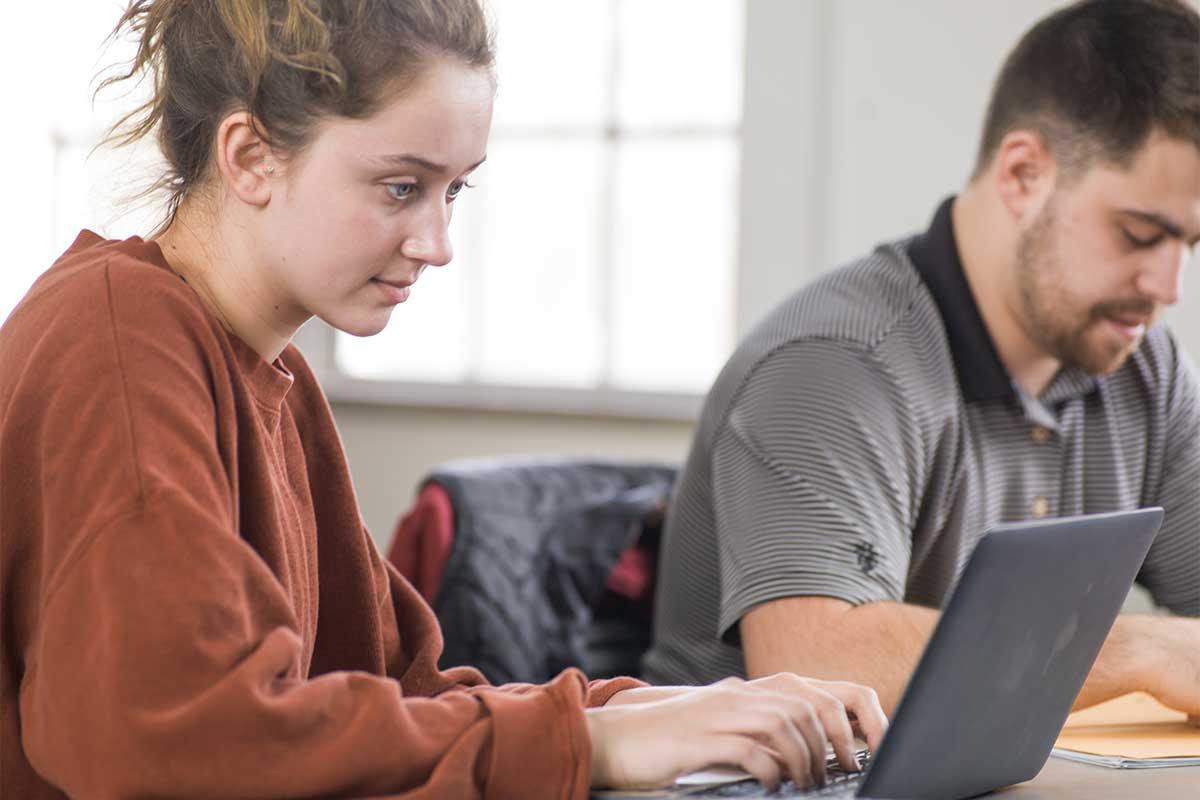 Student working on a laptop