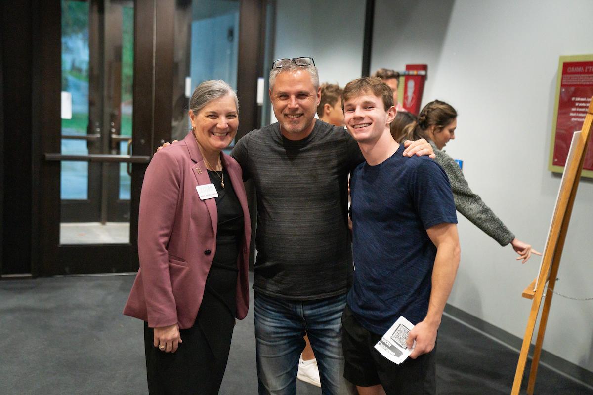 President with incoming student and parent